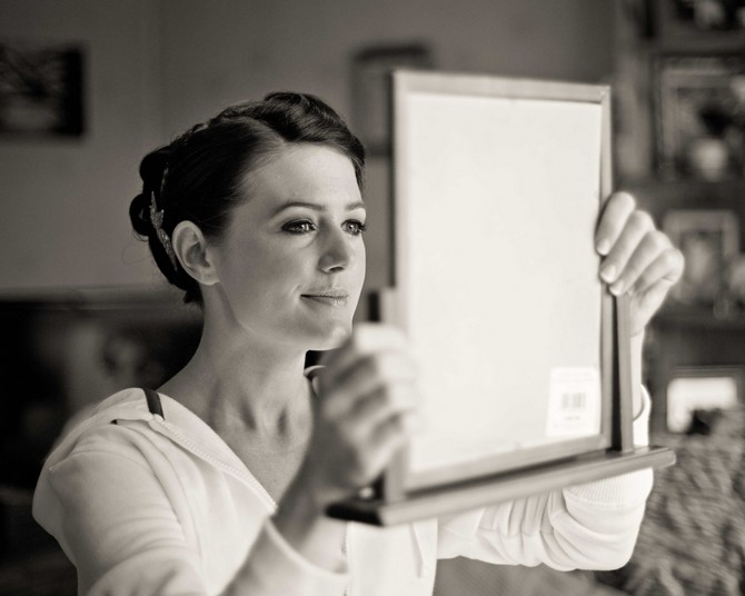 bride with mirror